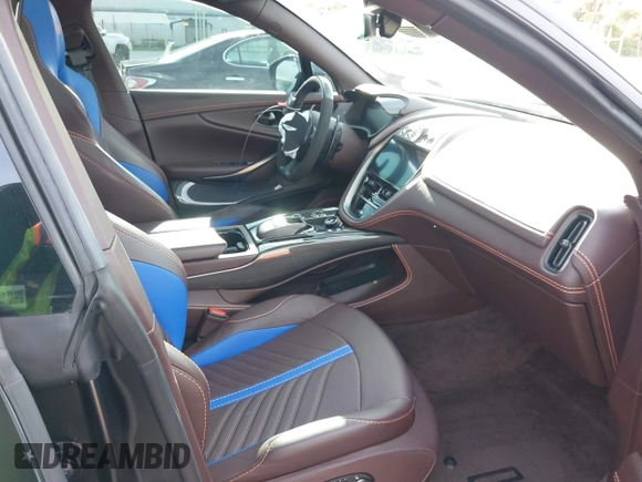 2023 Aston Martin DBX 707 z VIN SD7VUJBW8PTV07531, wystawiony jako IAAI lot #41608734 z przebiegiem 8476 mil mil oraz . Historia ofert i sprzedaży dostępna na DreamBid. Obrazek 5.