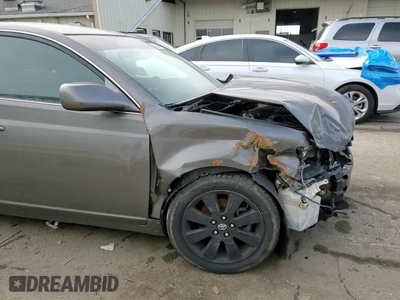 2007 Toyota Avalon XL z VIN 4T1BK36B47U203243, wystawiony jako Copart lot #43217085 z przebiegiem 250 749 mil mil oraz Nie do naprawy • Non repairable. Historia ofert i sprzedaży dostępna na DreamBid. Obrazek 11.