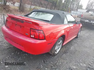2004 Ford Mustang Deluxe with VIN 1FAFP44654F162713, listed as a IAAI auction lot 41525265 with 213,365 mi miles. Bid and sale history available at carsss.com. Image 4.