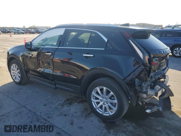 2023 Cadillac XT4 FWD Luxury z VIN 1GYAZAR42PF102696, wystawiony jako Copart lot #85540204 z przebiegiem 1 903 mil mil oraz Szkoda całkowita • Salvage title. Historia ofert i sprzedaży dostępna na DreamBid. Obrazek 2.