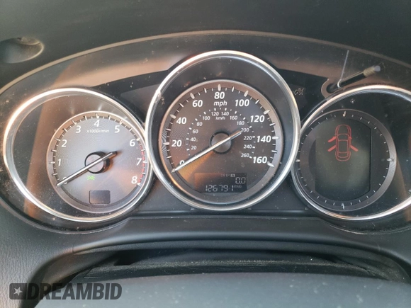 2014 Mazda CX-5 Grand Touring with VIN JM3KE4DY6E0376413, listed as a Copart auction lot 53204935 with 126,791 mi miles and Salvage Title. Bid and sale history available at DreamBid. Image 9.