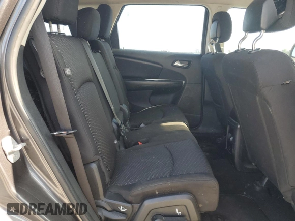 2014 Dodge Journey American Value with VIN 3C4PDCABXET277897, listed as a Copart auction lot 60566735 with 113,343 mi miles and Salvage title. Bid and sale history available at DreamBid. Image 11.