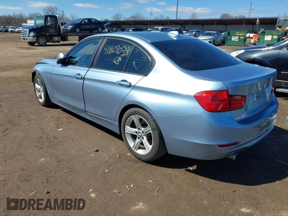 2014 BMW 3 Series 328i with VIN WBA3C1C56EAV79706, listed as a IAAI auction lot 41807033 with 104,478 mi miles. Bid and sale history available at carsss.com. Image 3.
