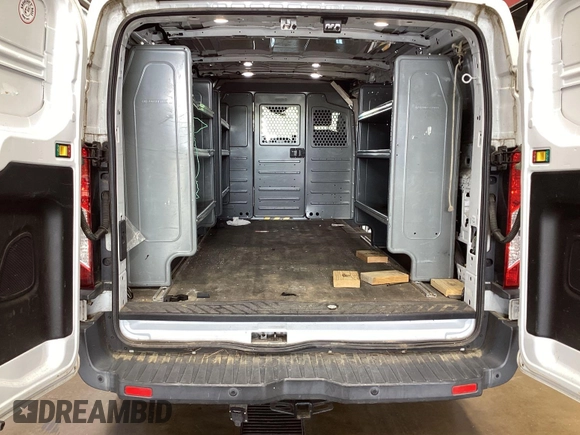2018 Ford Transit with VIN 1FTBW2ZM8JKA77066, listed as a IAAI auction lot 42642396 with 215,234 mi miles and . Bid and sale history available at DreamBid. Image 14.