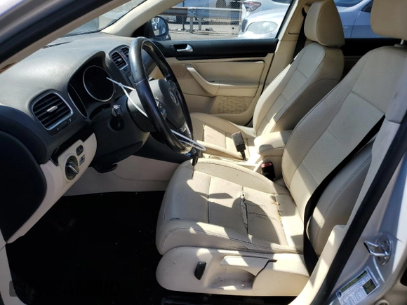 2010 Volkswagen Jetta SportWagen TDI with VIN 3VWTL7AJ9AM670212, listed as a Copart auction lot 71556684 with 129,314 mi miles and Salvage Title. Bid and sale history available at carsss.com. Image 7.