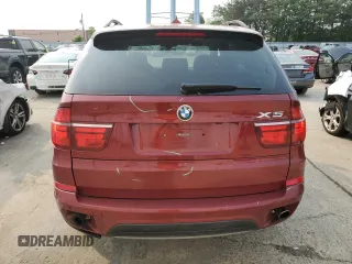 2012 BMW X5 35i z VIN 5UXZV4C56CL749152, wystawiony jako Copart lot #59525155 z przebiegiem 110 773 mil mil oraz Szkoda całkowita • Salvage title. Historia ofert i sprzedaży dostępna na DreamBid. Obrazek 6.