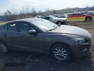 2014 Mazda 3 i Grand Touring with VIN JM1BM1M75E1207754, listed as a IAAI auction lot 41698583 with 128,887 mi miles and . Bid and sale history available at DreamBid. Image 13.