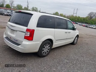 2013 Chrysler Town & Country Touring with VIN 2C4RC1BG2DR632444, listed as a IAAI auction lot 41989048 with 99,668 mi miles. Bid and sale history available at carsss.com. Image 4.