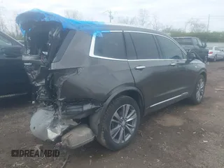 2020 Cadillac XT6 FWD Premium Luxury z VIN 1GYKPCRS0LZ136228, wystawiony jako IAAI lot #41912953 z przebiegiem Nie podano mil oraz . Historia ofert i sprzedaży dostępna na DreamBid. Obrazek 4.