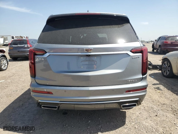 2023 Cadillac XT6 FWD Luxury with VIN 1GYKPAR47PZ113833, listed as a Copart auction lot 49066235 with 25,794 mi miles and Salvage Title. Bid and sale history available at carsss.com. Image 6.