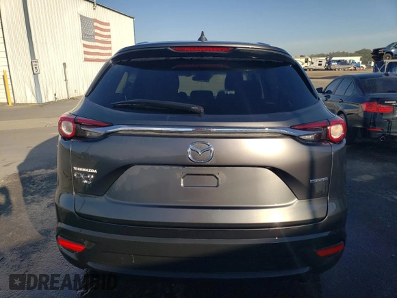 2021 Mazda CX-9 Sport with VIN JM3TCBBY5M0502888, listed as a Copart auction lot 61299673 with 50,576 mi miles and . Bid and sale history available at DreamBid. Image 6.