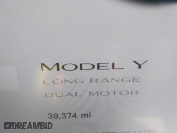 2022 Tesla Model Y Long Range with VIN 7SAYGDEE7NF549278, listed as a IAAI auction lot 42072801 with 39,374 mi miles and . Bid and sale history available at carsss.com. Image 16.