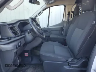 2021 Ford Transit Cargo with VIN 1FTBR1Y83MKA70780, listed as a Copart auction lot 77207664 with Not Provided miles and Clean Title. Bid and sale history available at DreamBid. Image 7.