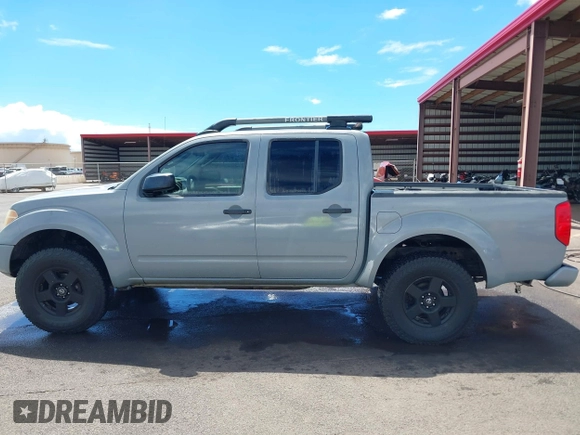 2007 Nissan Frontier LE with VIN 1N6AD07W17C438647, listed as a IAAI auction lot 40502289 with 153,553 mi miles and . Bid and sale history available at DreamBid. Image 14.