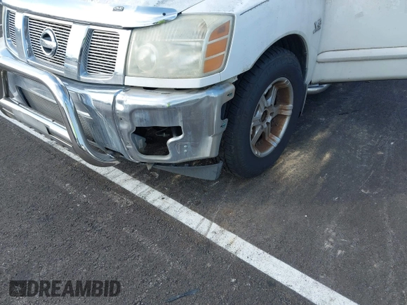 2004 Nissan Titan LE with VIN 1N6AA07A34N517511, listed as a IAAI auction lot 42250560 with 122,189 mi miles and . Bid and sale history available at DreamBid. Image 6.
