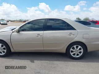 2006 Toyota Camry STD z VIN 4T1BE30KX6U658158, wystawiony jako IAAI lot #42394262 z przebiegiem 102 830 mil mil oraz . Historia ofert i sprzedaży dostępna na DreamBid. Obrazek 14.