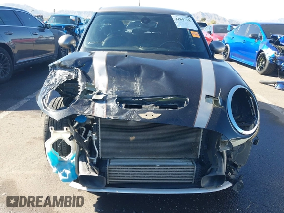 2017 MINI Hardtop 4 Door Cooper S z VIN WMWXU3C56H2D33072, wystawiony jako IAAI lot #41847726 z przebiegiem 81 783 mil mil oraz . Historia ofert i sprzedaży dostępna na DreamBid. Obrazek 6.
