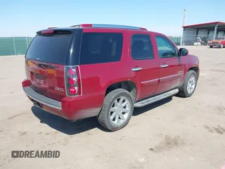 2008 GMC Yukon Denali with VIN 1GKFK63858J161835, listed as a IAAI auction lot 42228567 with 157,879 mi miles and . Bid and sale history available at DreamBid. Image 4.