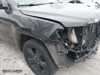 2015 Jeep Grand Cherokee Altitude with VIN 1C4RJFAG1FC210908, listed as a IAAI auction lot 41550173 with 168,905 mi miles. Bid and sale history available at carsss.com. Image 6.