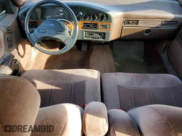 1989 Ford Taurus GL with VIN 1FABP52U1KA299938, listed as a Copart auction lot 86684144 with 52,675 mi miles and Salvage Title. Bid and sale history available at carsss.com. Image 8.