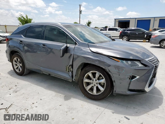 2016 Lexus RX 350 with VIN 2T2BZMCA4GC032889, listed as a Copart auction lot 62351685 with 114,556 mi miles and Salvage title. Bid and sale history available at DreamBid. Image 4.