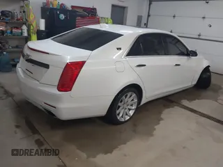 2015 Cadillac CTS Luxury AWD with VIN 1G6AX5SX5F0117267, listed as a IAAI auction lot 41762217 with 79,930 mi miles and . Bid and sale history available at DreamBid. Image 4.