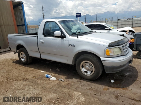 2002 Ford F-150 XL with VIN 1FTRF17242NB04340, listed as a Copart auction lot 58119345 with 218,734 mi miles and Non repairable. Bid and sale history available at DreamBid. Image 4.