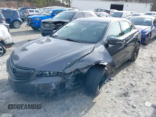 2015 Acura TLX V6 Advance with VIN 19UUB2F77FA020150, listed as a IAAI auction lot 41096144 with 127,414 mi miles. Bid and sale history available at carsss.com. Image 2.