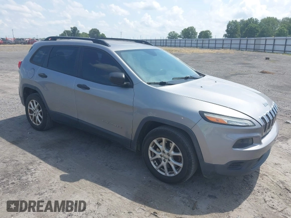 2015 Jeep Cherokee Sport z VIN 1C4PJLABXFW684235, wystawiony jako IAAI lot #42788242 z przebiegiem 260 453 mil mil oraz . Historia ofert i sprzedaży dostępna na DreamBid. Obrazek 1.