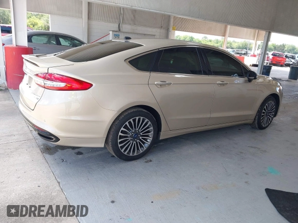 2018 Ford Fusion Titanium с VIN 3FA6P0D98JR268784, выставлен на аукционе IAAI как лот 42257897 с пробегом 145 446 миль миль и . История ставок и продаж доступна на DreamBid. Изображение 4.