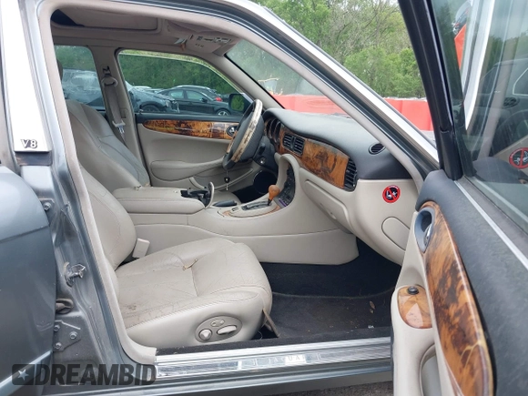 2002 Jaguar XJ with VIN SAJDA12CX2LF49531, listed as a IAAI auction lot 42124743 with 120,486 mi miles. Bid and sale history available at carsss.com. Image 5.