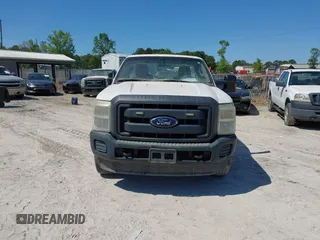 2014 Ford Super Duty F-250 SRW XL with VIN 1FDBF2B67EEA49254, listed as a IAAI auction lot 42136208 with 209,139 mi miles. Bid and sale history available at carsss.com. Image 6.
