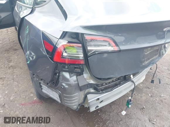 2023 Tesla Model 3 with VIN 5YJ3E1EAXPF628911, listed as a IAAI auction lot 42362410 with 25,387 mi miles and . Bid and sale history available at DreamBid. Image 22.