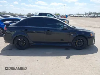 2016 Mitsubishi Lancer GT with VIN JA32U8FW8GU011501, listed as a IAAI auction lot 41779016 with 153,082 mi miles. Bid and sale history available at carsss.com. Image 13.