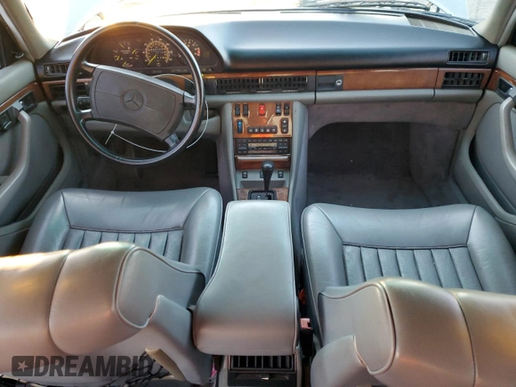 1988 Mercedes-Benz 560 with VIN WDBCA39D4JA391164, listed as a Copart auction lot 82628704 with 88,482 mi miles and Clean Title. Bid and sale history available at DreamBid. Image 8.