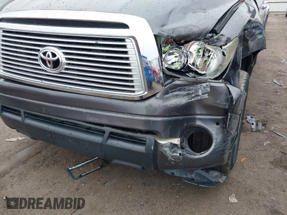 2012 Toyota Tundra 4WD Truck LTD with VIN 5TFHW5F17CX211075, listed as a IAAI auction lot 41510976 with 204,930 mi miles. Bid and sale history available at carsss.com. Image 18.
