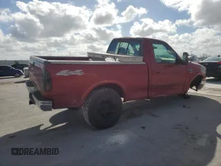 2000 Ford F-150 XL with VIN 1FTRF18W4YNB41818, listed as a Copart auction lot 78877544 with Not provided miles and Salvage title. Bid and sale history available at DreamBid. Image 3.