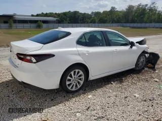 2023 Toyota Camry LE z VIN 4T1C11AK1PU770237, wystawiony jako Copart lot #55590655 z przebiegiem 50 980 mil mil oraz Szkoda całkowita • Salvage title. Historia ofert i sprzedaży dostępna na DreamBid. Obrazek 3.