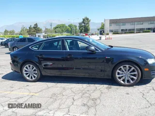 2013 Audi A7 Premium Plus with VIN WAUYGAFCXDN132677, listed as a IAAI auction lot 42630446 with 132,398 mi miles and . Bid and sale history available at DreamBid. Image 13.