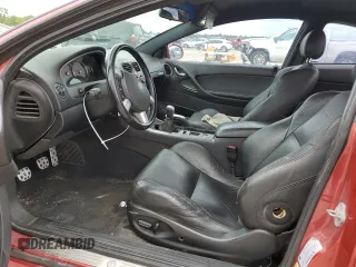 2006 Pontiac GTO z VIN 6G2VX12U66L564449, wystawiony jako Copart lot #71022094 z przebiegiem 179 964 mil mil oraz Szkody całkowita. Historia ofert i sprzedaży dostępna na DreamBid. Obrazek 7.
