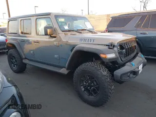 2024 Jeep Wrangler Sport S with VIN 1C4RJXN64RW337985, listed as a IAAI auction lot 41261982 with 1,845 mi miles and . Bid and sale history available at DreamBid. Image 1.