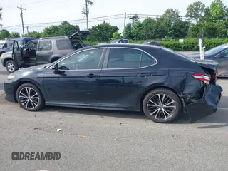 2019 Toyota Camry LE z VIN 4T1B11HK2KU281694, wystawiony jako IAAI lot #42289169 z przebiegiem 111 058 mil mil oraz . Historia ofert i sprzedaży dostępna na DreamBid. Obrazek 14.