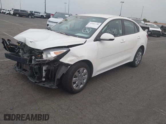 2021 Kia Rio LX with VIN 3KPA24AD3ME422560, listed as a IAAI auction lot 41005730 with 59,206 mi miles. Bid and sale history available at carsss.com. Image 2.