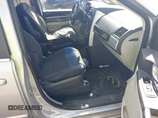 2009 Dodge Grand Caravan SXT z VIN 2D8HN541X9R663021, wystawiony jako IAAI lot #42202983 z przebiegiem 255 173 mil mil oraz . Historia ofert i sprzedaży dostępna na DreamBid. Obrazek 5.