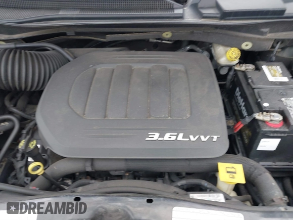 2013 Chrysler Town & Country Touring with VIN 2C4RC1BG5DR554662, listed as a IAAI auction lot 41833006 with 143,626 mi miles and . Bid and sale history available at DreamBid. Image 10.