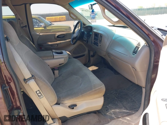 2000 Ford F-150 XL with VIN 1FTRX18L5YNA99713, listed as a IAAI auction lot 42194838 with Not provided miles and . Bid and sale history available at DreamBid. Image 5.