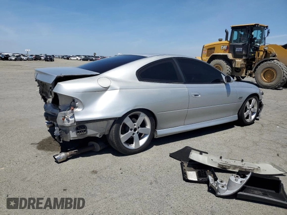 2006 Pontiac GTO z VIN 6G2VX12U16L565993, wystawiony jako Copart lot #57291015 z przebiegiem 190 257 mil mil oraz Szkoda całkowita • Salvage title. Historia ofert i sprzedaży dostępna na DreamBid. Obrazek 3.