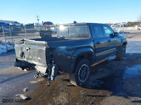 2024 Toyota Tacoma 4WD SR5 with VIN 3TMLB5JN9RM040490, listed as a IAAI auction lot 41480152 with 10,490 mi miles. Bid and sale history available at carsss.com. Image 4.