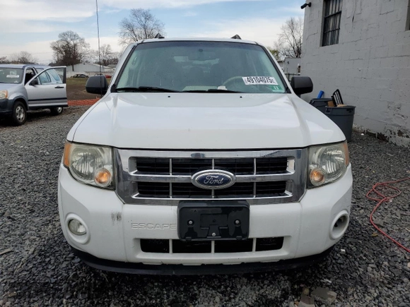2012 Ford Escape XLT z VIN 1FMCU9DG9CKC69762, wystawiony jako Copart lot #49104075 z przebiegiem 92 937 mil mil oraz Szkoda całkowita • Salvage title. Historia ofert i sprzedaży dostępna na DreamBid. Obrazek 5.