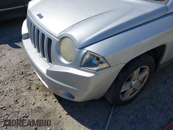 2007 Jeep Compass Sport with VIN 1J8FT47067D418752, listed as a IAAI auction lot 41785177 with 183,100 mi miles. Bid and sale history available at carsss.com. Image 6.